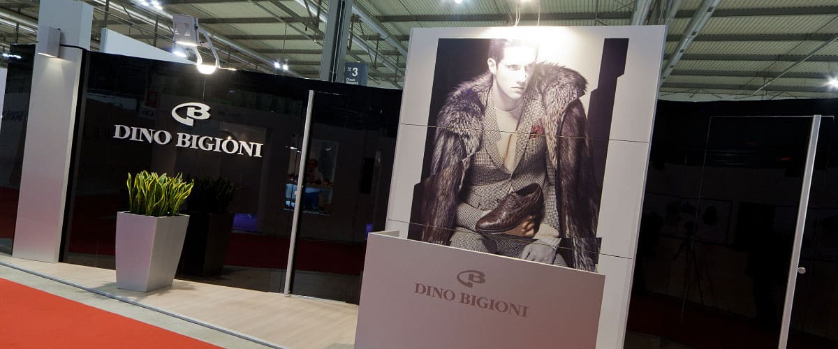 L'immagine raffigura un caso reale di allestimento fieristico: l'allestimento dello stand Dino Bigioni realizzato per Micam Milano